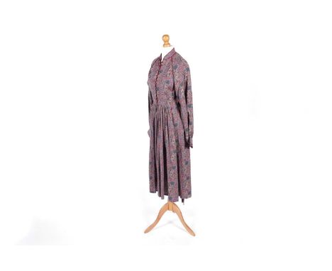 A 1970s Liberty of London brushed cotton paisley dress, with mandarin collar, button-down bodice, long sleeves, and a gathere