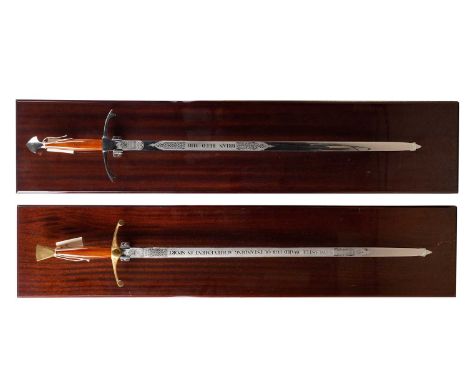 Two Wilkinson Sword presentation swords, each with inscription 'Newcastle Award For Outstanding Achievement In Sport' and 'Br