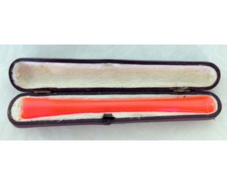 An unusual Art Deco cheroot/cigarette holder in its original case. Made from bakelite or early plastic in fluorescent orange 