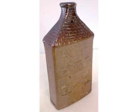 Early 19th century Lambeth ware stoneware spirit flask in the form of a wine merchant's shop  (Watts 5 London Wall). Incised 