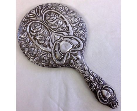 An Art Nouveau HM Silver hand mirror with 'Green Man' & flower decoration. Birmingham 1910, maker Robert Pringle & Sons.