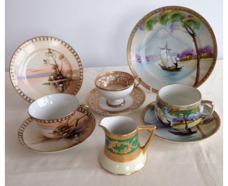 2 handpainted vintage Nippon trios together with a heavily gilded Noritake cup & saucer with pedestal and green & gold creame