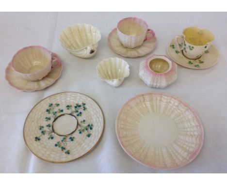 A collection of 1st black backstamp Belleek to include 2 shell dishes & 2 cups and saucers (1863-90), together with a 3rd mar