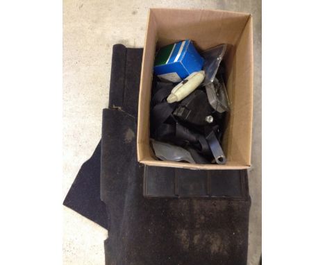 A box of Mini spare parts & carpet.