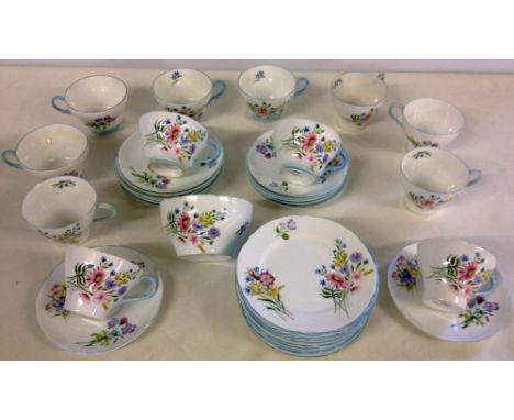 A quantity of Shelley porcelain in the 'Wildflower' pattern - comprising 6 breakfast cups, 6 teacups 13 saucers, 12 teaplates
