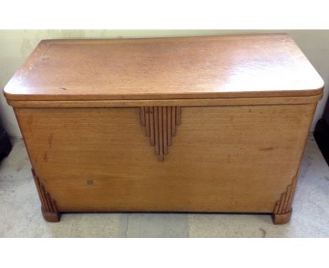 An Art Deco light oak blanket box.