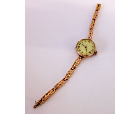 A ladies 9ct gold watch & strap dated 1917 in working order. Back engraved 'To my darling wife June 28th 1917 H & M.