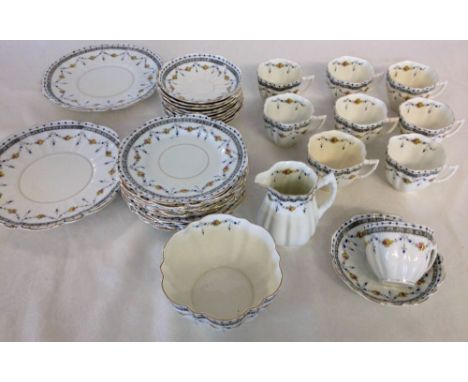 A Cartwright & Edwards Victoria Works part 12 piece tea set comprising milk jug, sugar bowl, 9 tea cups, 11 saucers, 12 tea p