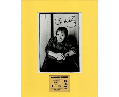 Mounted Signature of Chris de Burgh with black and white photo and 1978 ticket no.42. Mounted on Yellow Card with Signature. 