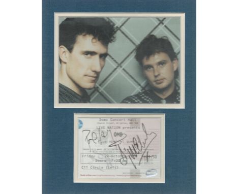 Mounted Signature of OMD with colour photo with Original Tickets from the Concert. Mounted on Blue Card with Signatures on th
