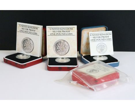 A collection of four Royal Mint United Kingdom silver proof £1 coins to include Piedfort examples, all encapsulated within fi