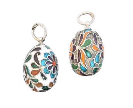 Two silver enamel egg pendants, of floral design, Russian marks, lengths 3.3cm, gross weight 11g.Condition report: Overall co