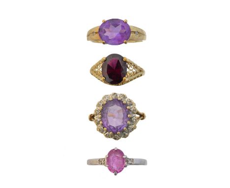 Four 9ct gold gem-set dress rings, to include a pink sapphire and diamond three stone ring, an amethyst and diamond cluster r