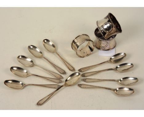 A set of 10 George V silver teaspoons, Sheffield 1927, Cooper Brothers & Sons, each with fleur du lys finial, including a pai