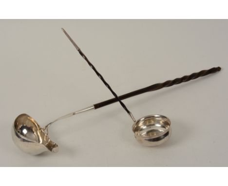 A Georgian silver toddy ladle by Robert McGregor of Perth, with whalebone handle, together with a larger silver toddy ladle, 
