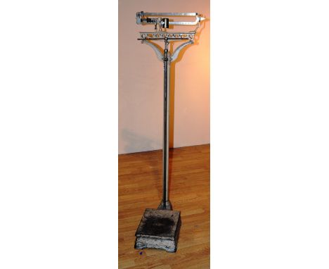 A set of vintage painted metal doctors scales, 154cm high