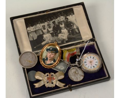 A collection of ephemera relating to a World War I German nurse, comprising of silver cased fob watch, with fob and ribbon at