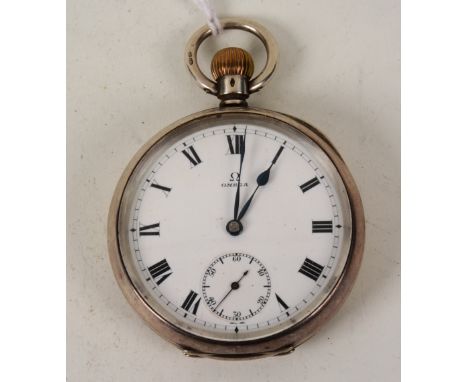 An Omega silver cased open faced pocket watch, the white enamel dial with Roman numerals and subsidiary seconds dial, marked 