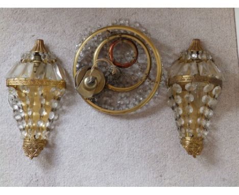 A pair of reproduction glass lustre drop wall light fittings and one other. (3)