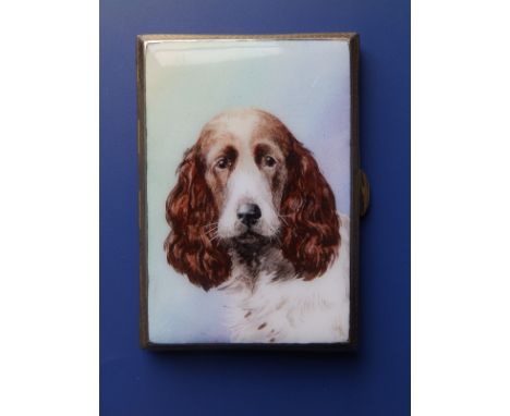 A small enamelled gilt metal cigarette case, the lid decorated with a portrait of a spaniel.