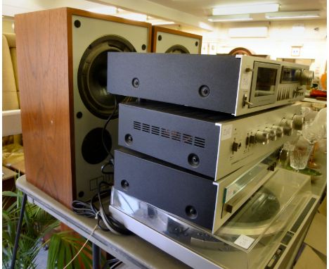 A Pioneer stereo system  comprising a record deck PL-100, Tuner TX-410L, amplifier SA-41U, cassette tape deck and a pair of M