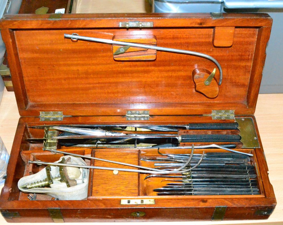 A 19th Century Mahogany Cased Set of Surgical Instruments, the brass ...