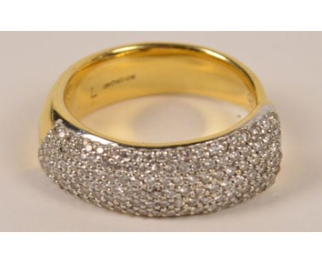 An 18ct yellow gold pavé set diamond broad ring, size K, approx 8.8g.