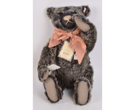 A boxed British Collectors' 2007 Steiff teddy bear no.662508 "Old Black Bear", with numbered white and red tag to ear, with g