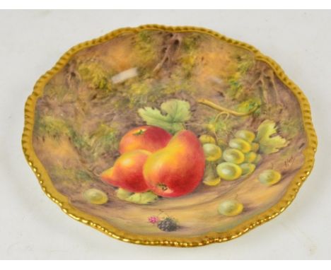 A Royal Worcester shaped circular plate hand painted with pears and grapes within a gilt heightened border, signed "P Love", 