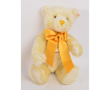 A boxed British Collectors' 2000 Steiff teddy bear no.654763, with numbered white and red tag to ear, with champagne coloured