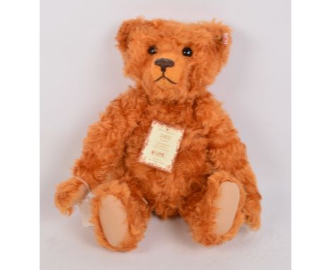 A boxed British Collectors' 2005 Steiff teddy bear no.661969, with numbered white and red tag to ear, with golden apricot moh