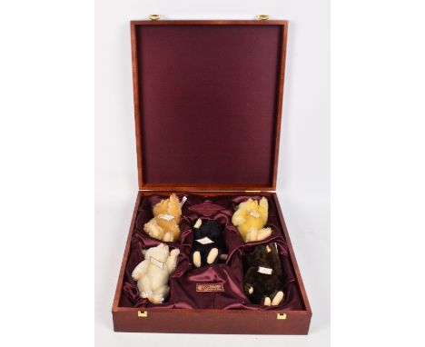 A boxed British Collectors' Steiff baby bear set 1989-1993, issued in 1997, no.654497, each bear a 16cm miniature of the orig