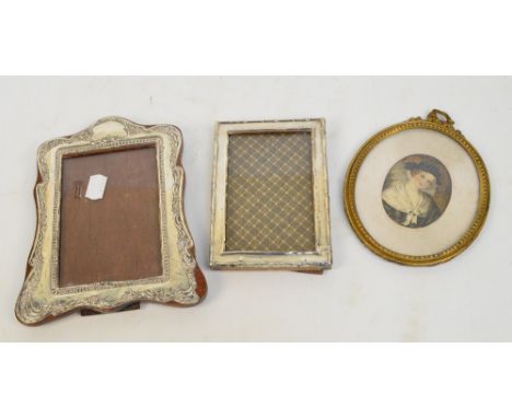 A George V hallmarked silver mounted rectangular photograph frame, G & C Ltd, Birmingham 1923, 14.5 x 10cm, a further silver 