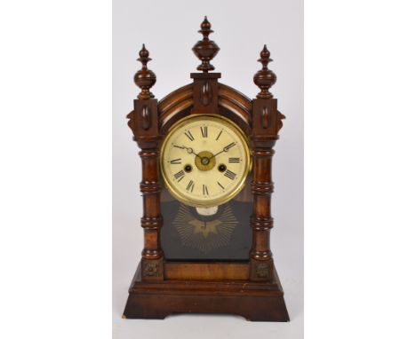 A late 19th century Junghans eight day mantel clock, height 42.5cm to top of central finial.
