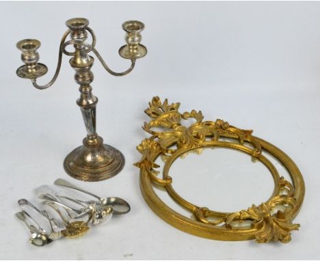 A silver plated candelabra with removable curling twin branch, height 34cm, a small quantity of plated flatware including sug