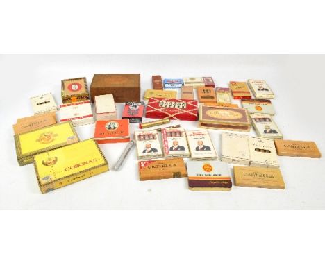 A collection of cigars and tobacco including  Ritmeester Half Corona, Sir Walter Raleigh pipe tobacco, King Edward Invincible