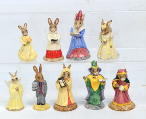 A collection of Royal Doulton Bunnykins figures; DB101 "Bride", DB102 "Groom", DB173 "Bridesmaid", Collectors' edition DB223 