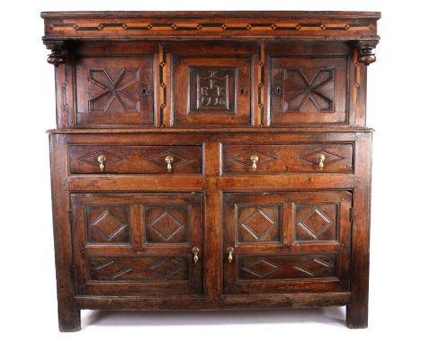                         A George I oak and bog oak inlaid didarn, Snowdonia, North Wales, dated 1716, the canopy top with che