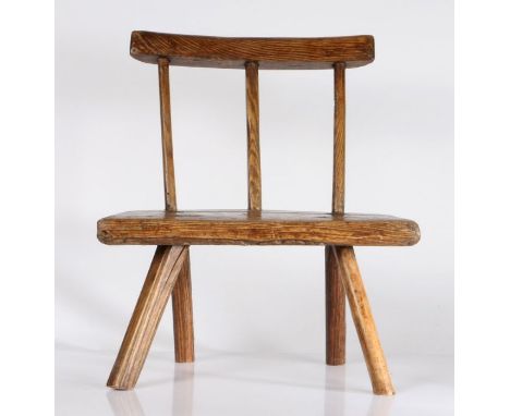                         A George III ash primitive child's stick-back chair, circa 1800, the back of three spindles, with pla