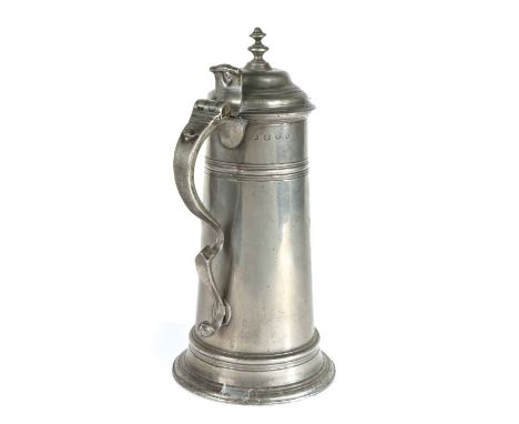 A good George I pewter spouted spire flagon, circa 1720Of OEWS half-gallon capacity, the tapering drum on a splayed and heavi