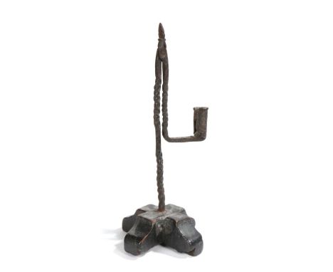                         An interesting George III wrought iron and timber table rush light and candle holder, circa 1800, the
