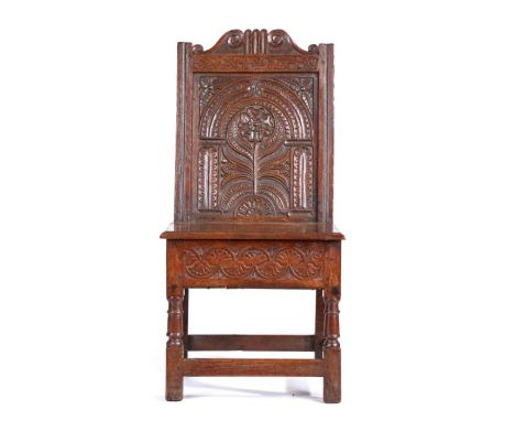                         An uncommon Charles I box-seat closed-back side chair, Lancashire, circa 1630-40, the well-carved bac