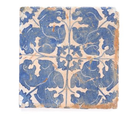                         A 16th century blue and white sgraffito tile, Catalan, Spain, designed with adorsed mythical beasts t