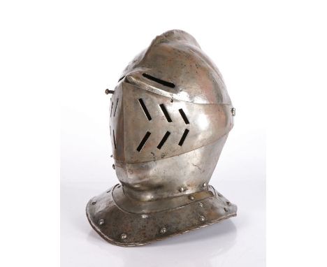                        A Cuirassier close helmet, English or French, circa 1620 and later,  With rounded two-piece skull wit