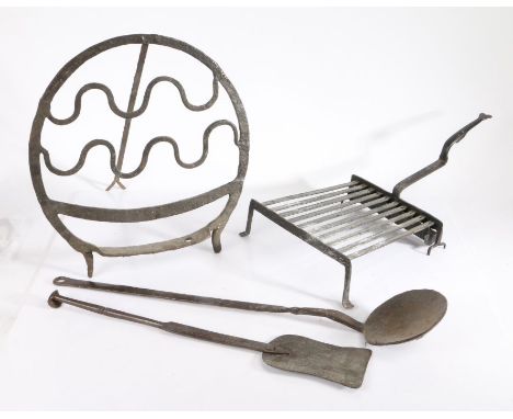                         Four 18th/19th century iron cooking utensils, to include: a trivet, a slice, a bread warmer or 'hanan