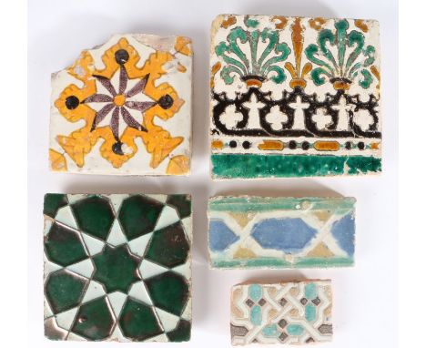 
    
        
            A 17th century tile, Spanish, Moorish star design in dark green lustre, together with a black and 