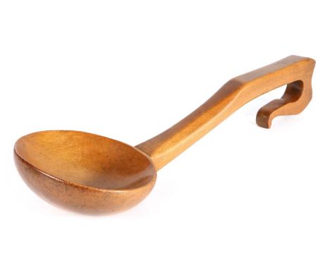                         A 19th century fruitwood ladle, Welsh, the long arched handle with a deep wide bowl, 41cm long       