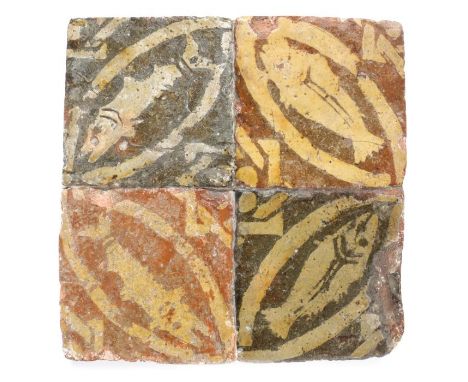 
    
        
            An interesting 14th century floor tile section, French, circa 1300-50, of four tiles set into a mo