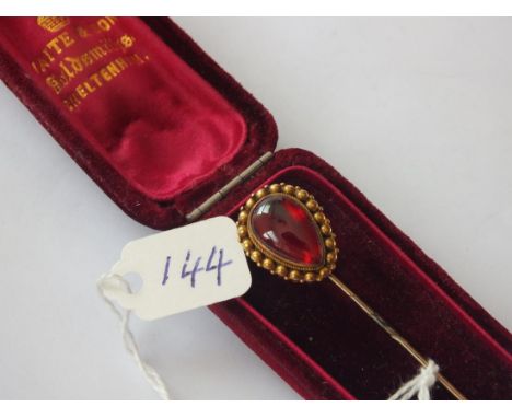 Good gold and garnet cabochon stick pin boxed   