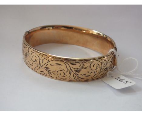 Rolled gold hinged bangle      